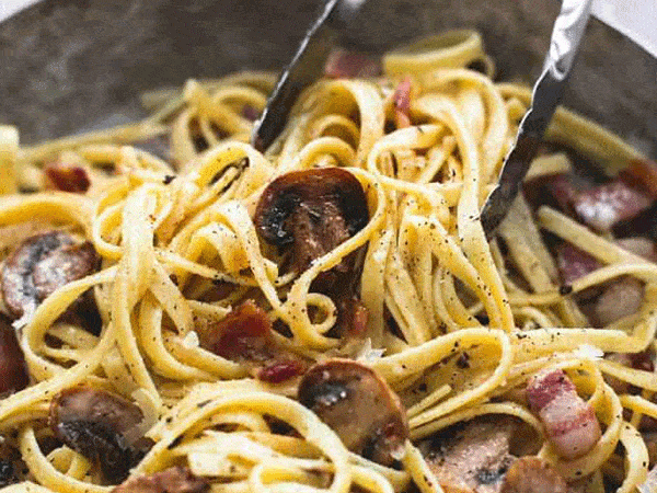 
          
            Pasta with a Bacon and Mushroom Cream Sauce.
          
        